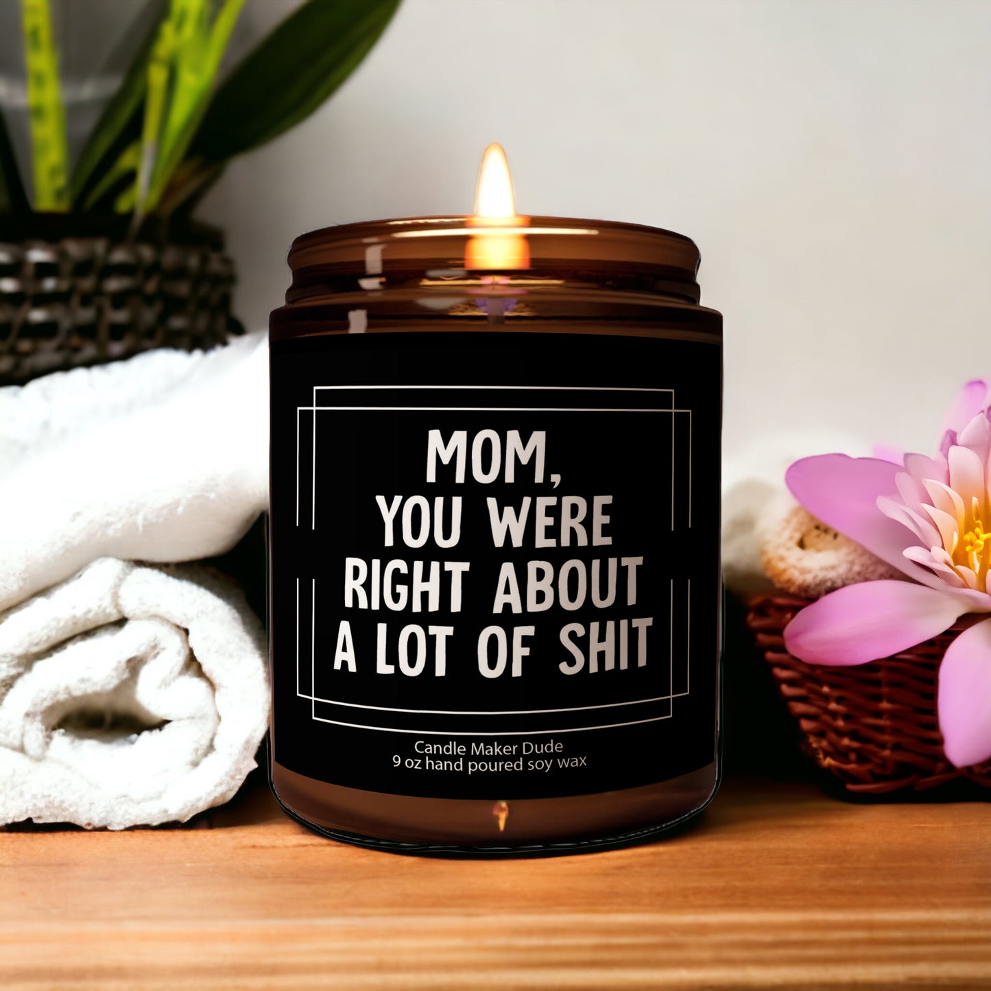 a candle sitting on top of a wooden table