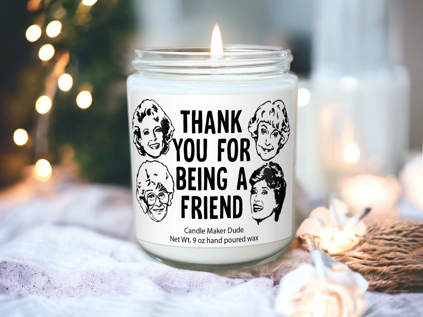 a white candle with a thank you for being a friend sticker on it