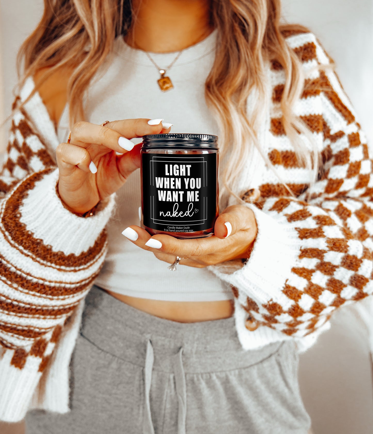 a woman holding a jar of light when you want it