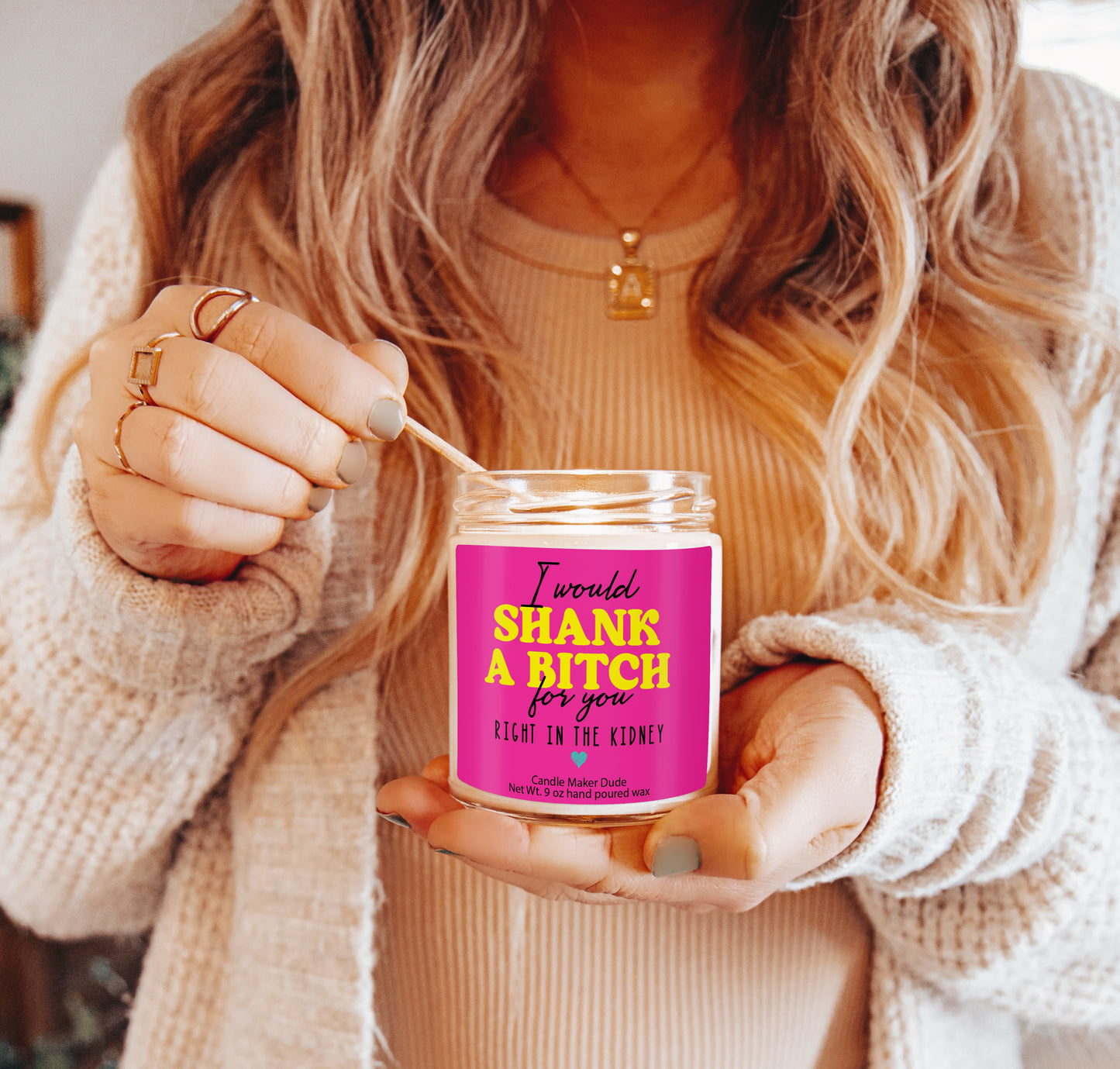 a woman is holding a jar of food